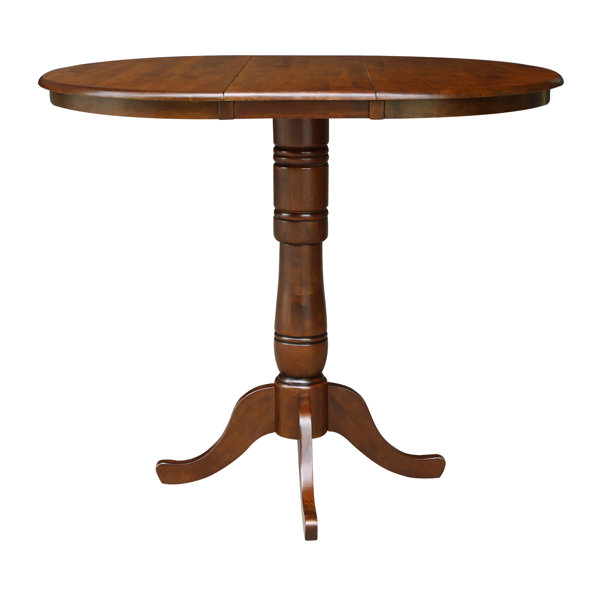 August Grove® Madeline Extendable Round Solid Wood Dining Table